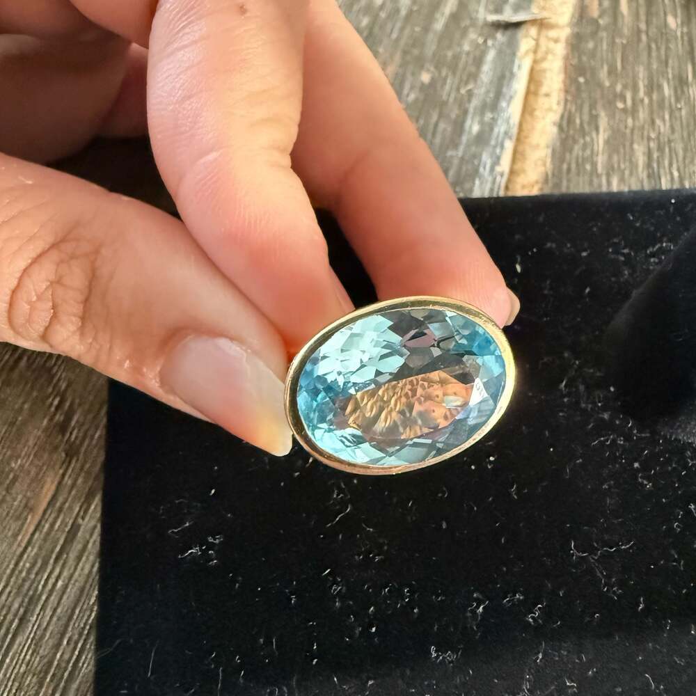 Satya Jewelry 925 India Sterling Silver Gold-Plated Oval Blue Topaz Ring
